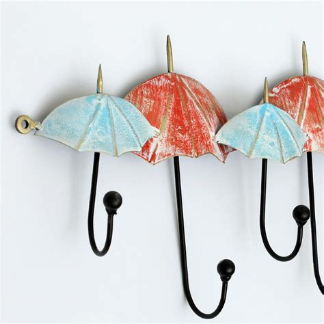 Buy VEDAS Metal Umbrella 6-Knob Wall Hook from Vedas at just INR 3999.0