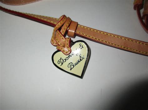 Dooney and Bourke Logo Crossbody Purse Tassel - Gem