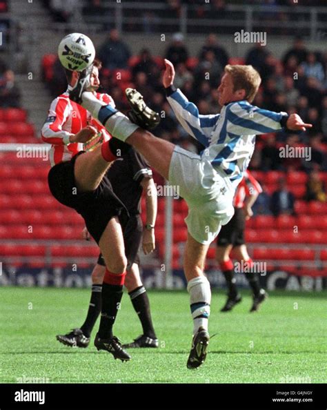 Sport football action michael bridges hi-res stock photography and ...