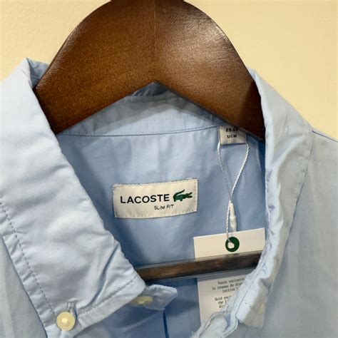Lacoste blue solid button down shirt – Trove