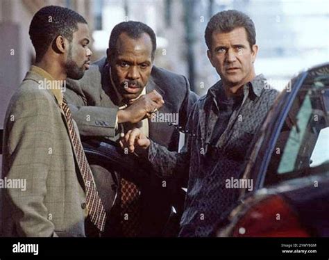 LETHAL WEAPON 4 1998 Warner Bros. film with from left: Chris Rock ...
