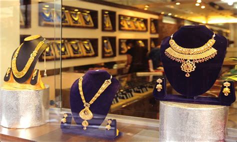 Gold prices rule flat after two-day rally on custom duty hike | Gold ...
