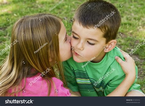 Sister Giving Her Brother Kiss On Stock Photo 31101412 | Shutterstock