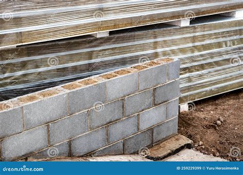 A Wall of Hollow Concrete Blocks at a Construction Site. the Use of ...