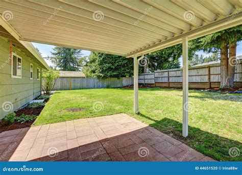 Backyard Patio with Brick Tile Floor Stock Photo - Image of brick ...