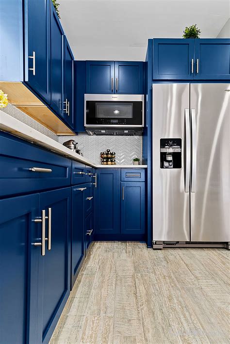 Waterfall kitchen island blue cabinets - lerymilk