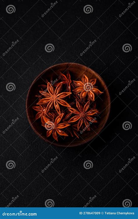 Star Shaped Spice Star Anise in a Wooden Round Bowl Stock Image - Image ...