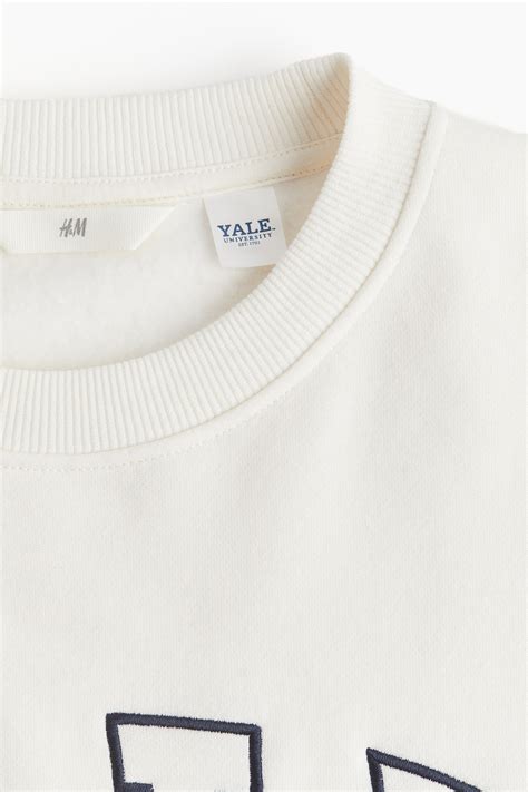 Motif-detail sweatshirt - White/Yale University - Ladies | H&M GB