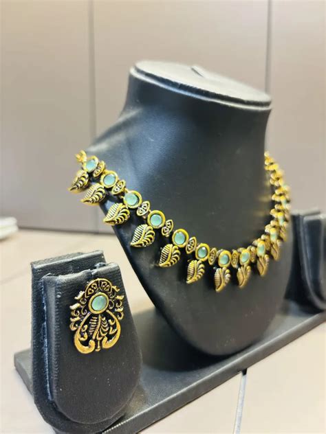 Antique Gold with Green Stones Necklace Set | Crafted Jewellery for you
