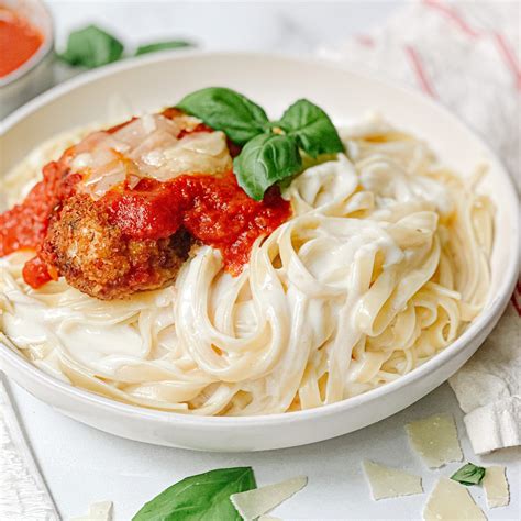 Crispy Chicken Parm with Fettuccine Alfredo - Plum Street Collective