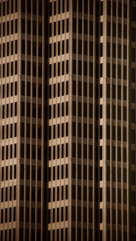 Download wallpaper 938x1668 buildings, facade, faces, architecture ...