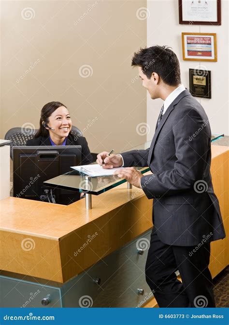 Receptionist Greeting Woman At Front Desk Royalty-Free Stock Image | CartoonDealer.com #6603868