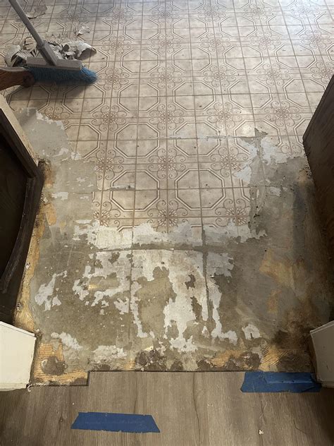 What is the easiest way to remove this 30 year old linoleum flooring ...