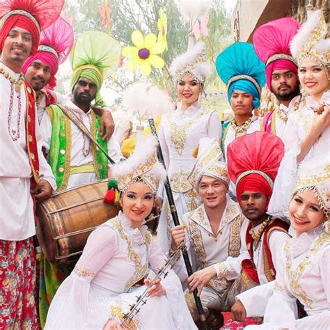 Uzbekistani artists pose for photograph with Panjab artists during 28th ...