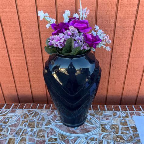 Lot #204 - Vintage dark blue glass floor vase with faux flower bouquet ...