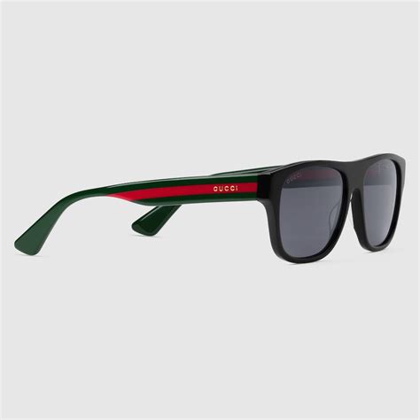 Gafas de sol con montura rectangular en acetato negro | GUCCI® ES