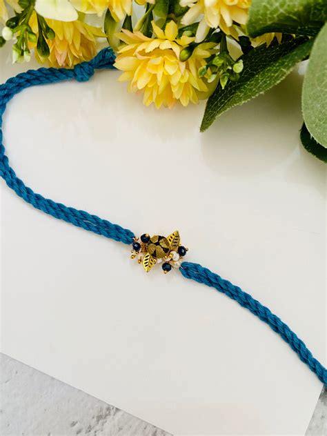 Sun om hand made bhabhi rakhi – Madhurya Rakhi