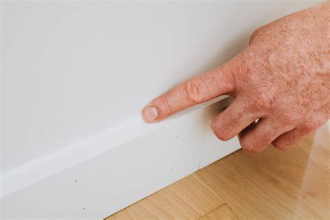 HOW TO INSTALL BASEBOARDS LIKE THE PROFESSIONALS - Nadine Stay