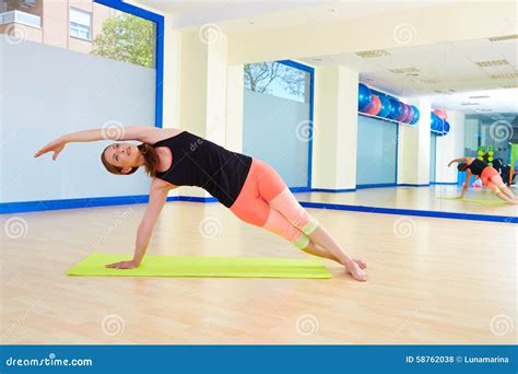 Pilates Woman Side Bend Exercise Workout at Gym Stock Photo - Image of ...