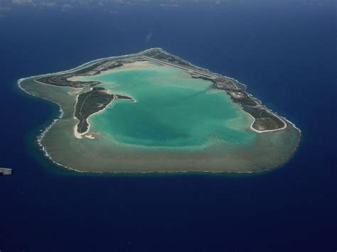 WWII U.S. pilots flying over Wake Island, occupied by imperial Japanese ...