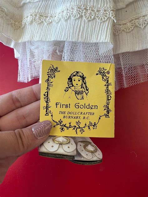 Hand-painted First Golden Doll porcelain doll | Total Storage Winnipeg