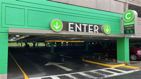 Natick Mall parking garage concrete dangled, removed from ceiling
