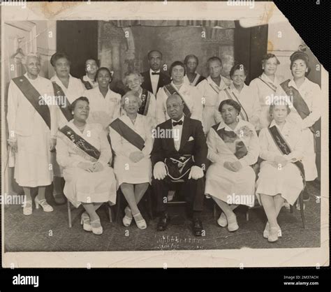 Group portrait of men and women in the Masonic Order of the Eastern ...