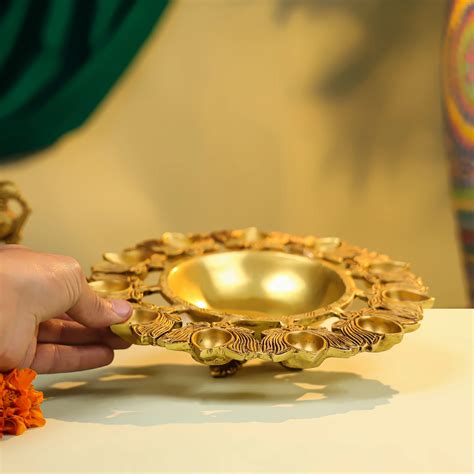 Buy 9" Brass Eleven Lotus Diya Urli for Festive Decor – Ethnic India ...