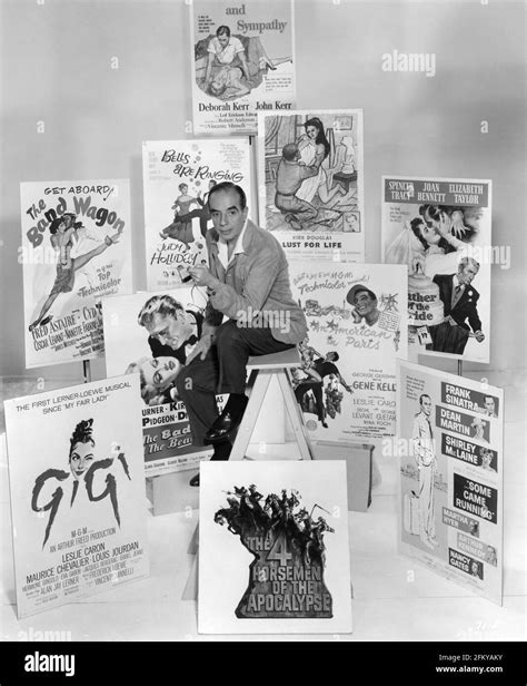 Director VINCENTE MINNELLI portrait surrounded by movie posters from ...
