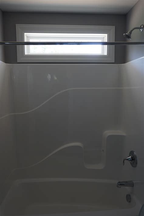 Bathroom with Window Above Bathtub