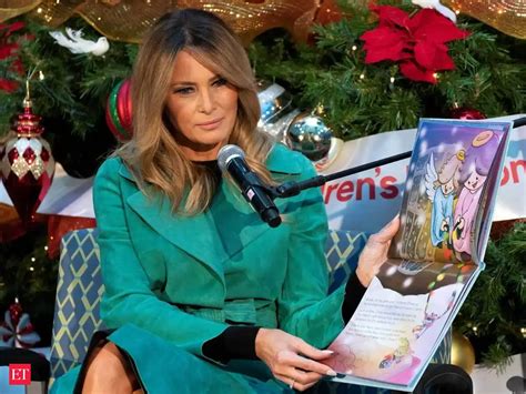 Melania Trump puts children at risk as she takes off her mask during a ...