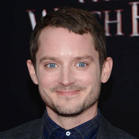Download Elijah Wood Slightly Grinning Wallpaper | Wallpapers.com