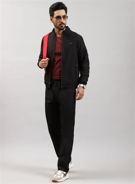 Buy Men Black Solid Cotton Blend Tracksuit Online in India - Monte Carlo