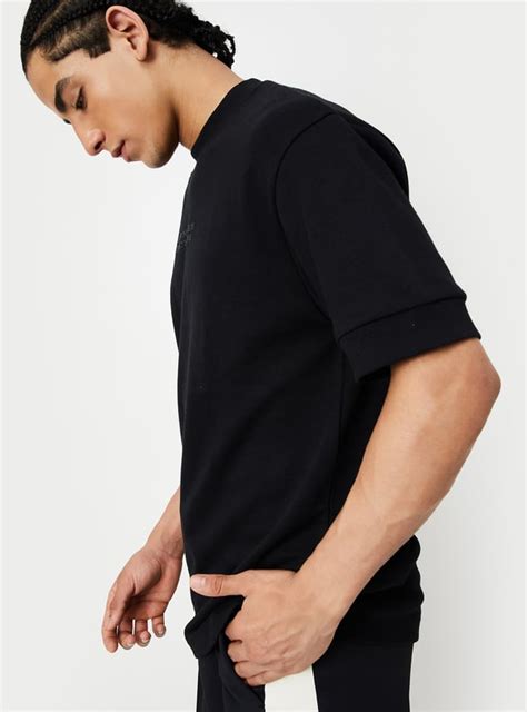 Buy Men Solid Oversized Athleisure T-shirt Online at just Rs. 799.0 ...