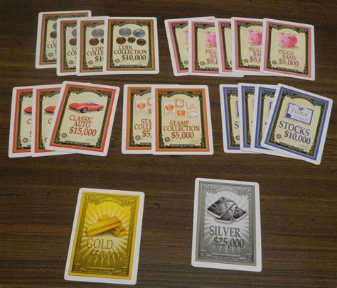 Cover Your Assets Card Game Review and Rules | Geeky Hobbies