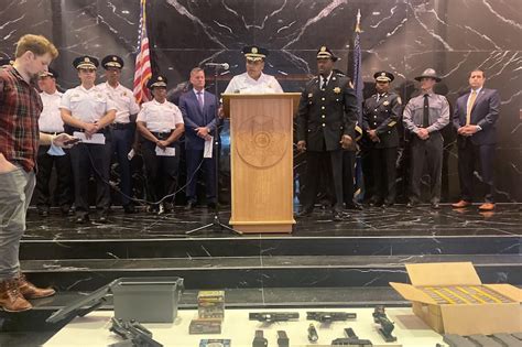 Dozens of fugitives arrested in predawn raids