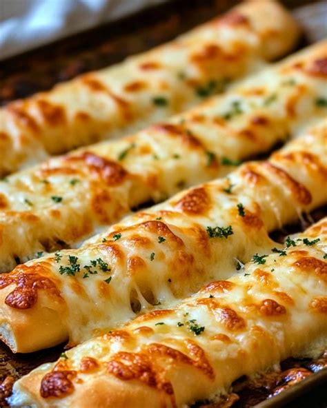 Easy Homemade Cheesy Italian Garlic Breadsticks - easypeasyrecipes.net