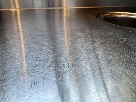 Any advice on removing/buffing out scratches from a stainless steel ...