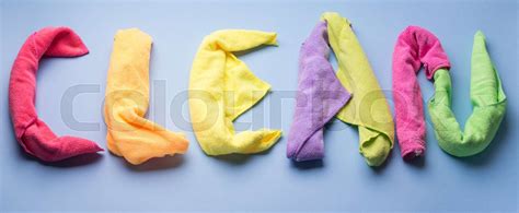 Word clean spelt with cleaning cloths | Stock image | Colourbox