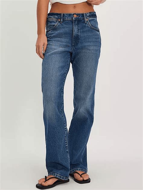 Move aside low-rise, all the fashion girls are wearing mid-rise jeans ...