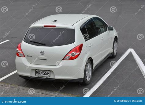 AUCKLAND, NEW ZEALAND - Nov 04, 2020: White Nissan Tiida at Car Park Editorial Photo - Image of ...