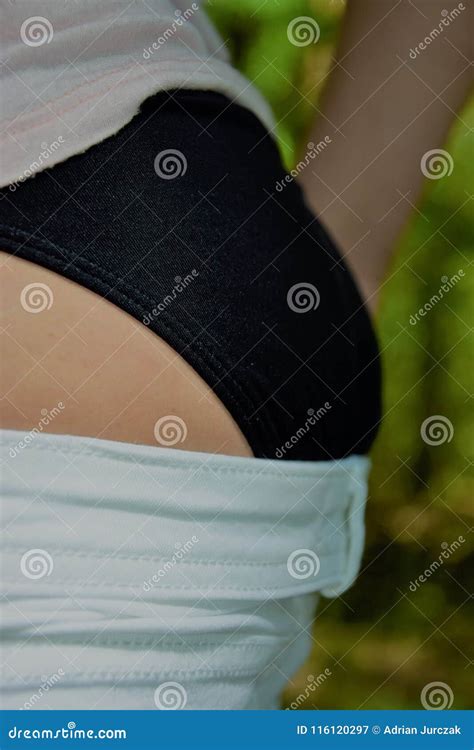 Woman Stretching Jeans on Her Buttocks Stock Image - Image of hips ...