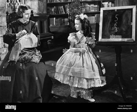 FILMS: JANE EYRE, 1944. /nJoan Fontaine and Margaret O'Brien in a scene ...