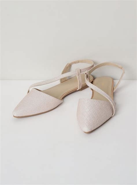 Buy Women Textured Sling Back Mules Online at just Rs. 899.0 ...