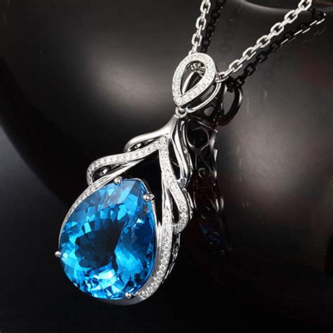 Silver Plated American Diamond Crushed Ice Cut Blue Teardrop Shape Pen ...