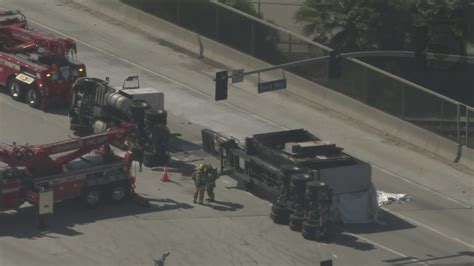 Workers clear burned-out semi from Southern California freeway