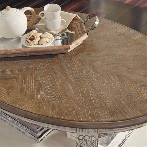 Realyn Cocktail Table - Ashley Furniture | AFW.com