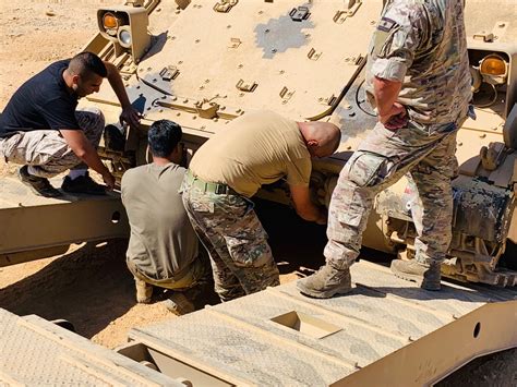 U.S. Army Soldiers Conduct Heavy Equipment Transporter Staff Exchange ...