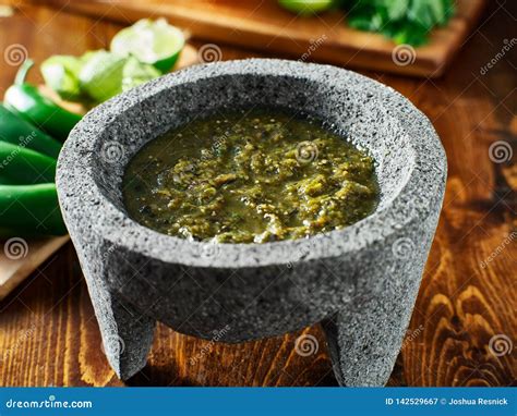 Mexican Salsa Verde in Traditional Stone Molcajete Stock Image - Image ...