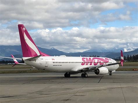 Download Swoop Aviation Preparing To Take Off Wallpaper | Wallpapers.com